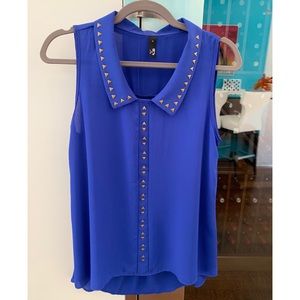 Royal blue sleeveless blouse, excellent condition.
